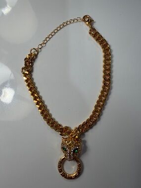 Fake Gold colored panther Chain Necklace with Green Crystal Eyes